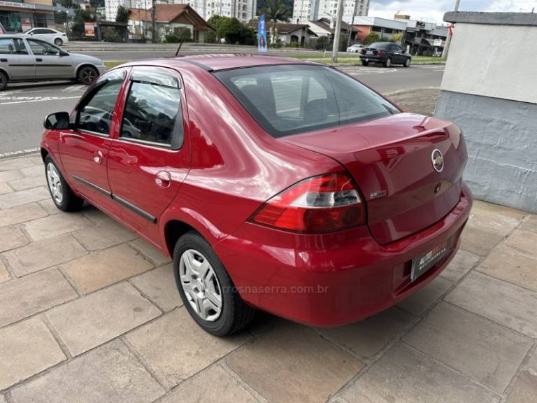 CHEVROLET - PRISMA - 2009/2009 - Vermelha - R$ 26.900,00