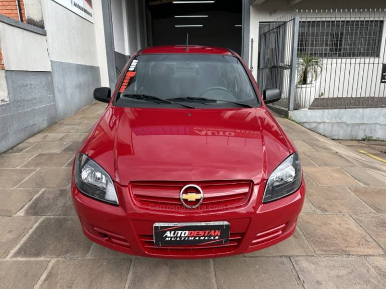 CHEVROLET - PRISMA - 2009/2009 - Vermelha - R$ 26.900,00